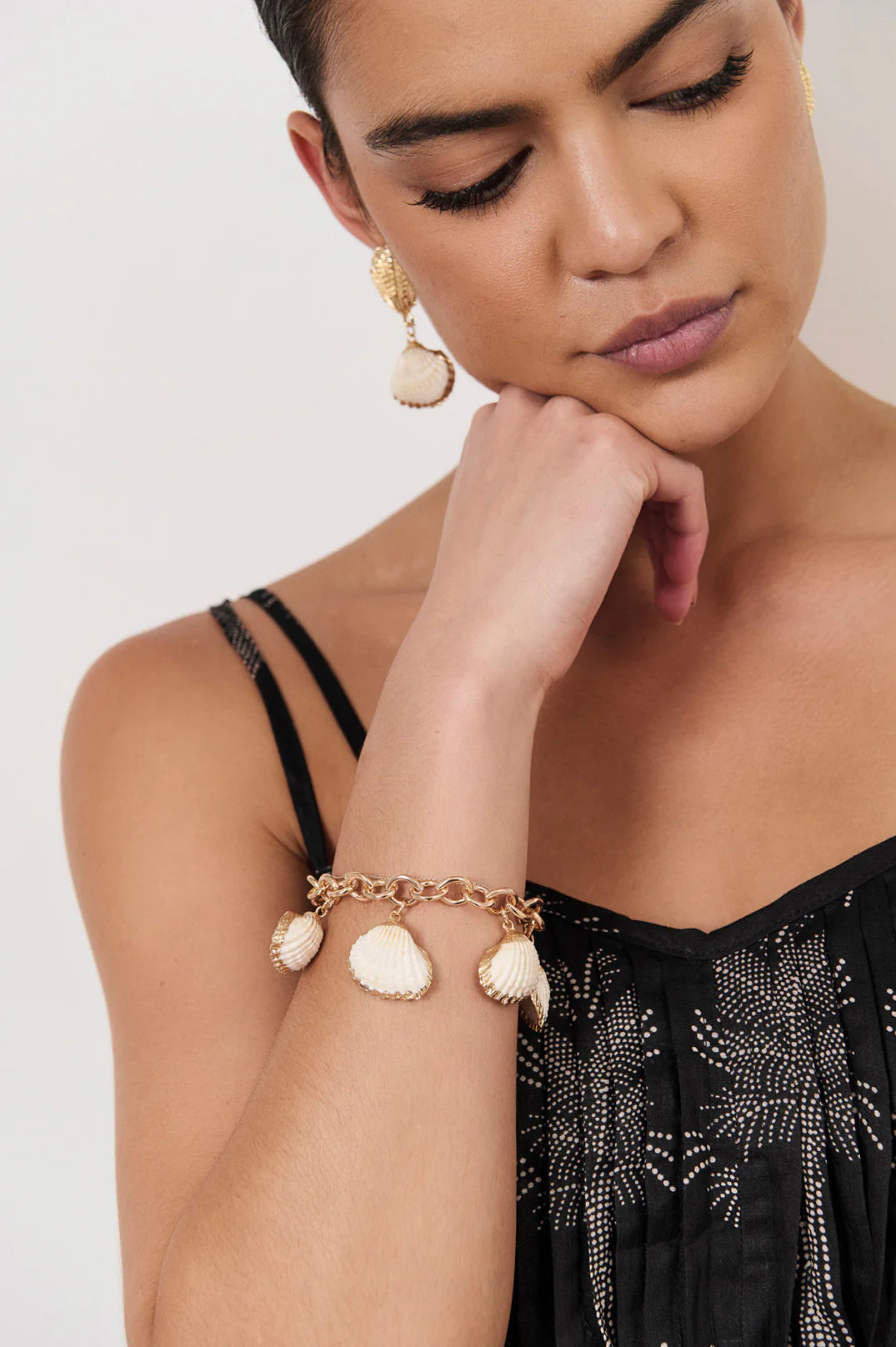 Metal Edged Shell Bracelet White/Gold Bracelets and Bangles Adorne